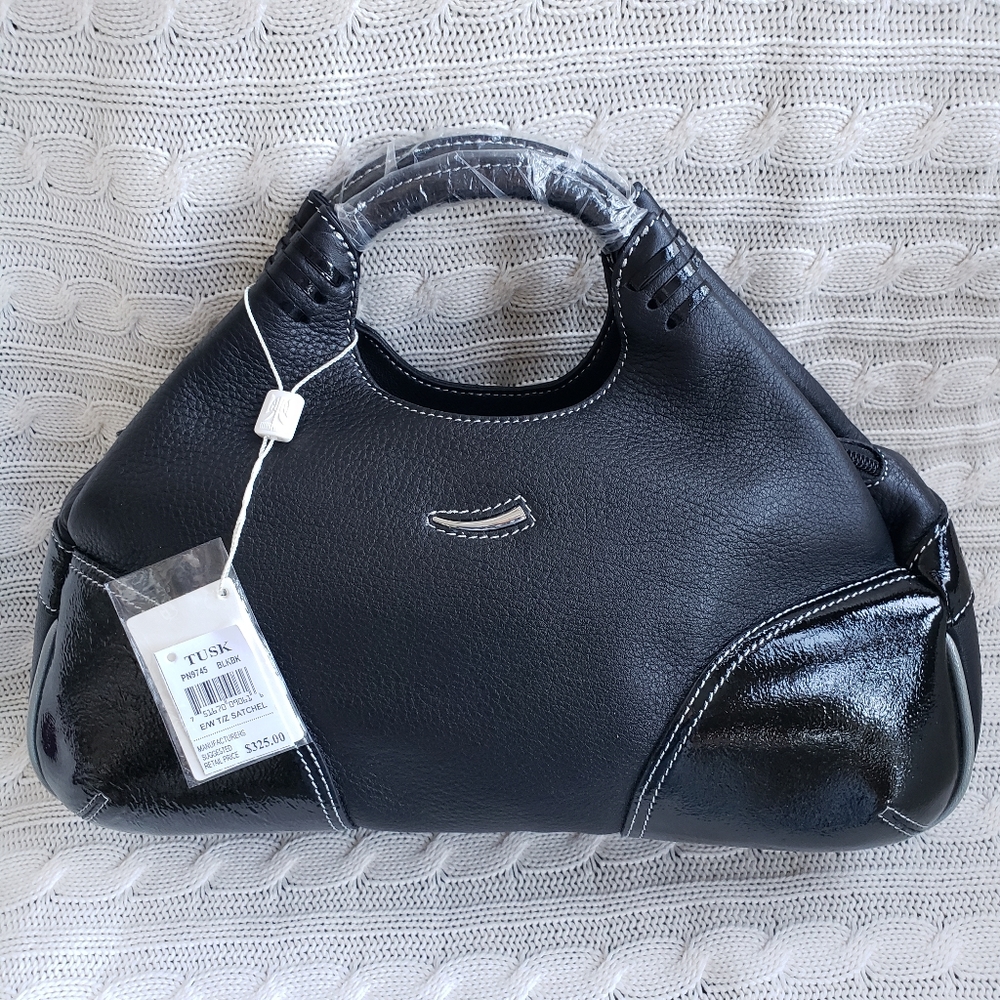 Tusk leather purse.